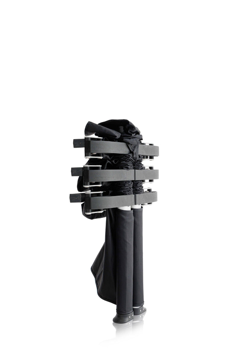 Collapsible travel cot that breaks down anywhere and can be packed compactly 